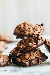 Vertical shot of chocolate cookies on the white background