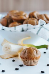 Vertical shot of blueberry muffins on the white background
