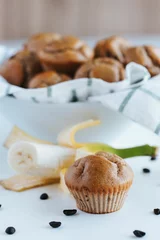 Foto op Plexiglas Vertical shot of blueberry muffins on the white background © Jeffrey Bethers/Wirestock Creators
