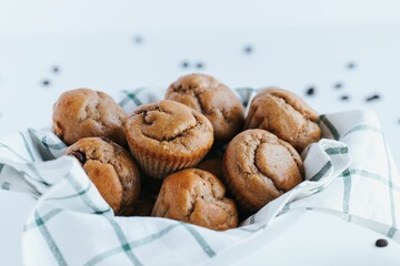 Closeup shot of blueberry muffins on the white background