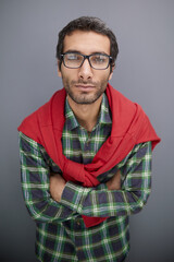 Fototapeta premium Thoughtful caucasian young man in glasses, looking into empty copy space thinking,