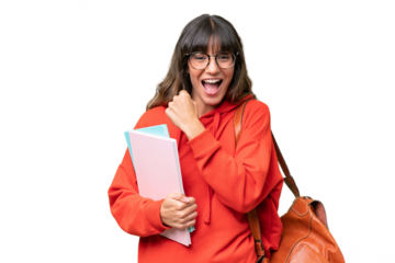 Young student caucasian woman over isolated background celebrating a victory
