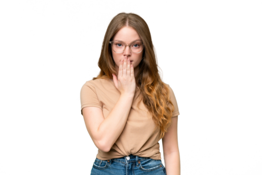 Young pretty woman over isolated background covering mouth with hand