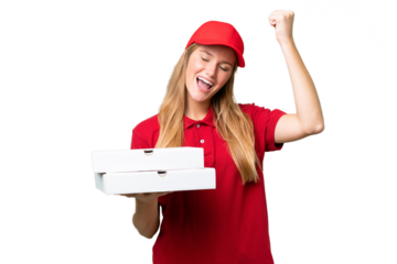 Young caucasian pizza delivery woman with work uniform picking up pizza boxes over isolated background celebrating a victory