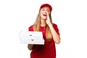Young caucasian pizza delivery woman with work uniform picking up pizza boxes over isolated background shouting with mouth wide open