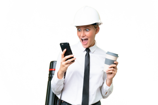 Young architect caucasian woman with helmet and holding blueprints over isolated background holding coffee to take away and a mobile