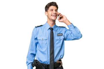 Young police man over isolated background keeping a conversation with the mobile phone