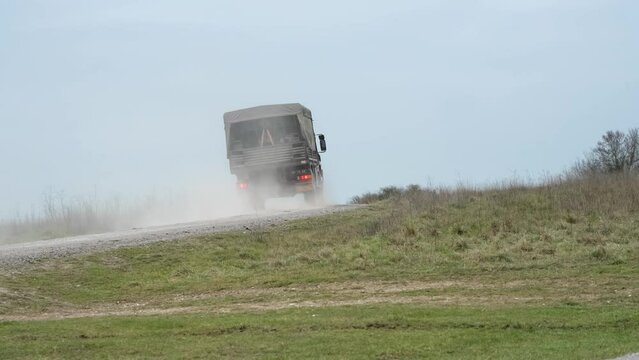 close-up of a British MAN SV4x4 Logistics Truck 4x4-wheel drive vehicle on a military exercise, Wiltshire UK