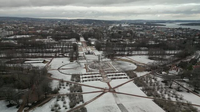 Winter aerial view of snow-covered Frogner park with landmark The Monolith