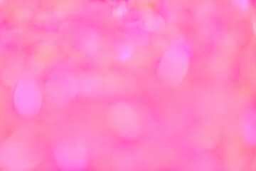 Blurred pastel neon pink golden holographic bokeh background texture. Abstract festive glittering Lo-fi retro design Smooth Blurred holographic iridescent colors . Festive glittering background.