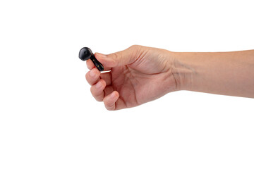 Wireless black bluetooth earphones in hand isolated close-up on a transparent background