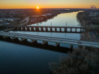 Aerial of road bridges stretching over the river Delaware in Trenton, New Jersey at sunrise