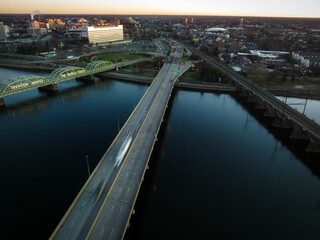 Aerial of the intersection of the Lower Trenton bridge and a highway bridge in Trenton at sunrise