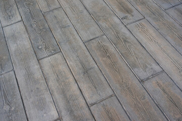 Wooden pavement walkway footpath in public. Wood grain on floor tile texture.