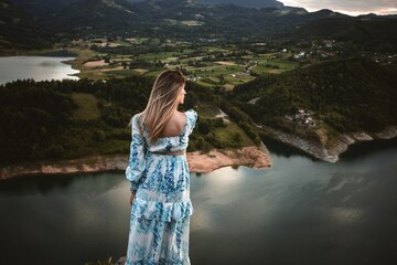 Caucasian female model in the mountains enjoying the view