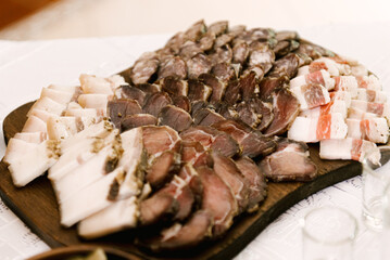 Delicious table of homemade rustic treats lard, meat