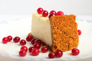 slice of cheesecake with cranberries