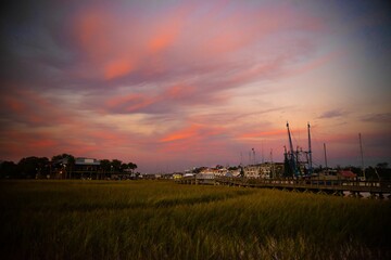Fototapeta premium Sunset at Shem Creek in Mount Pleasant, South Carolina near Charleston