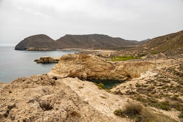 Landscape view of the rocky hills and formations near the beach