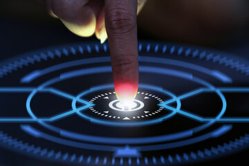 Human finger pushes touch screen button and activates futuristic Artificial Intelligence.