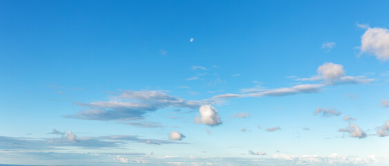 Obraz na płótnie Canvas Cloudscape - Blue sky and white clouds, wide panorama