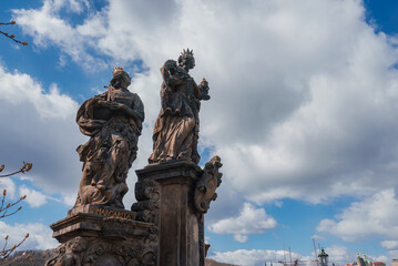 Crucifix on pedestrians only Charles Bridge over Vltava river in Prague, Czech Republic