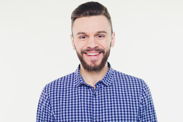 Fototapeta premium Strong, confident, handsome and bearded man in casual checkered shirt is posing isolated on white background with copy space for text and advertising
