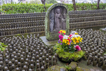 View of hundreds of small statues of the Jizo Bodhisattva at Hase Temple in Kamakura, Japan