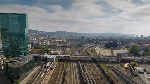 day time zurich city train station railroad traffic aerial panorama 4k timelapse switzerland