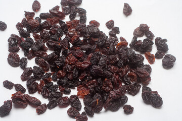 dried grapes on a white background
