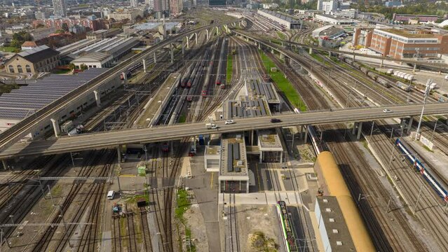sunny day zurich city train station railways traffic aerial panorama 4k timelapse switzerland