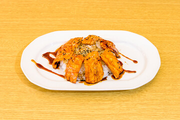 A recipe for salmon with rice, soy sauce and spices