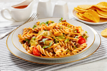 pasta salad with ground beef and veggies in bowl