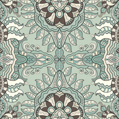 Hand drawn seamless graphic pattern, colorful artistic background with floral and geometric elements. Doodle ethnic mandala ornament for textile fabric, paper print. Surface texture 