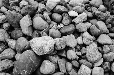 Pebbles and stones on the river bed, shot with analogue black and white film