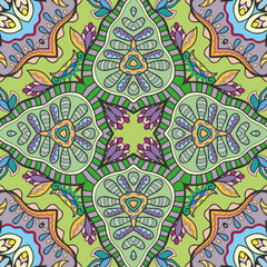 Hand drawn seamless graphic pattern, colorful artistic background with floral and geometric elements. Doodle ethnic mandala ornament for textile fabric, paper print. Surface texture 