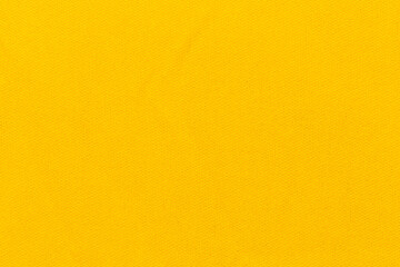 The Yellow color fabric cloth polyester texture and textile background.
