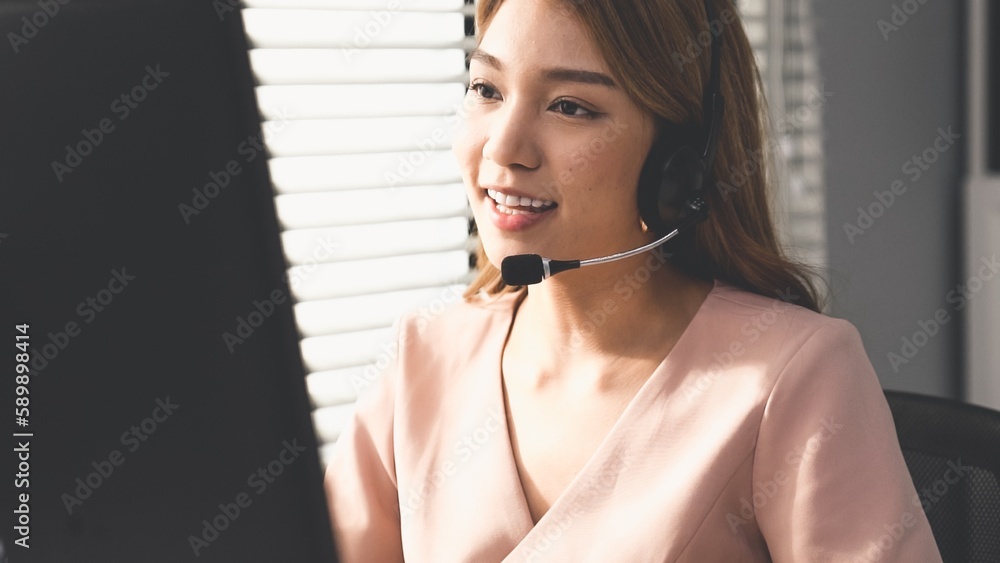Aufkleber competent female operator working on computer and while talking with clients. concept relevant to bo