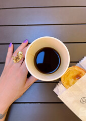 Coffee, breakfast, ring. Nothing better than a cup of coffee.