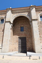 Fototapeta na wymiar Aracena, Huelva, Spain, March 30, 2023: Main gate of the Nuestra Señora de la Asuncion parish in Aracena, Huelva. Spain