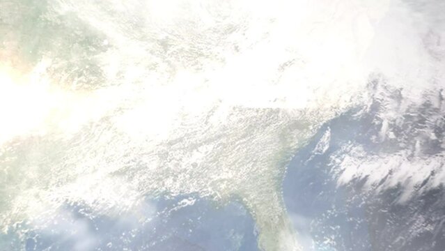 Earth zoom in from outer space to city. Zooming on Douglasville, Georgia, USA. The animation continues by zoom out through clouds and atmosphere into space. Images from NASA
