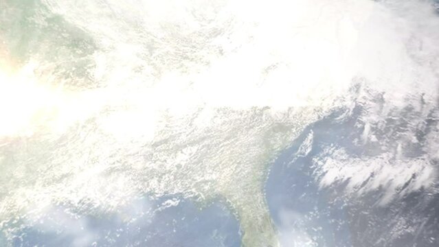 Earth zoom in from outer space to city. Zooming on Lawrenceville, Georgia, USA. The animation continues by zoom out through clouds and atmosphere into space. Images from NASA
