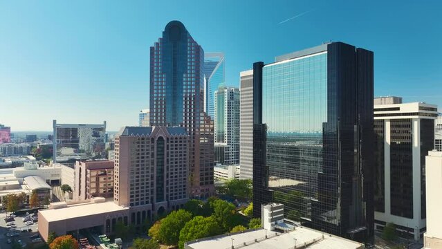 Aerial view of downtown district of Charlotte city in North Carolina, USA. Glass and steel high skyscraper buildings in modern american midtown