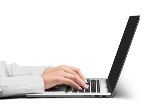Hands of woman typing on laptop isolated on white