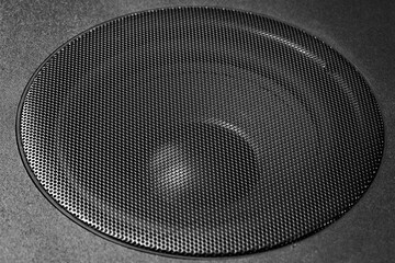 Close-up of a loudspeaker in a black case