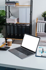Stylish workspace with laptop, notebook, blank screen laptop on white table of bookkeeping.