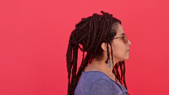 Portrait of woman with locs hairstyle