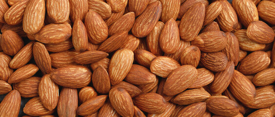 Almonds on a wooden background