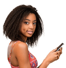 Beautiful african girl using mobile phone on white background