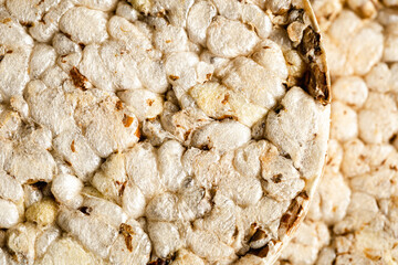 Food background, crunchy rice cake, healthy food concept, tasty crisp, snack with health benefits.